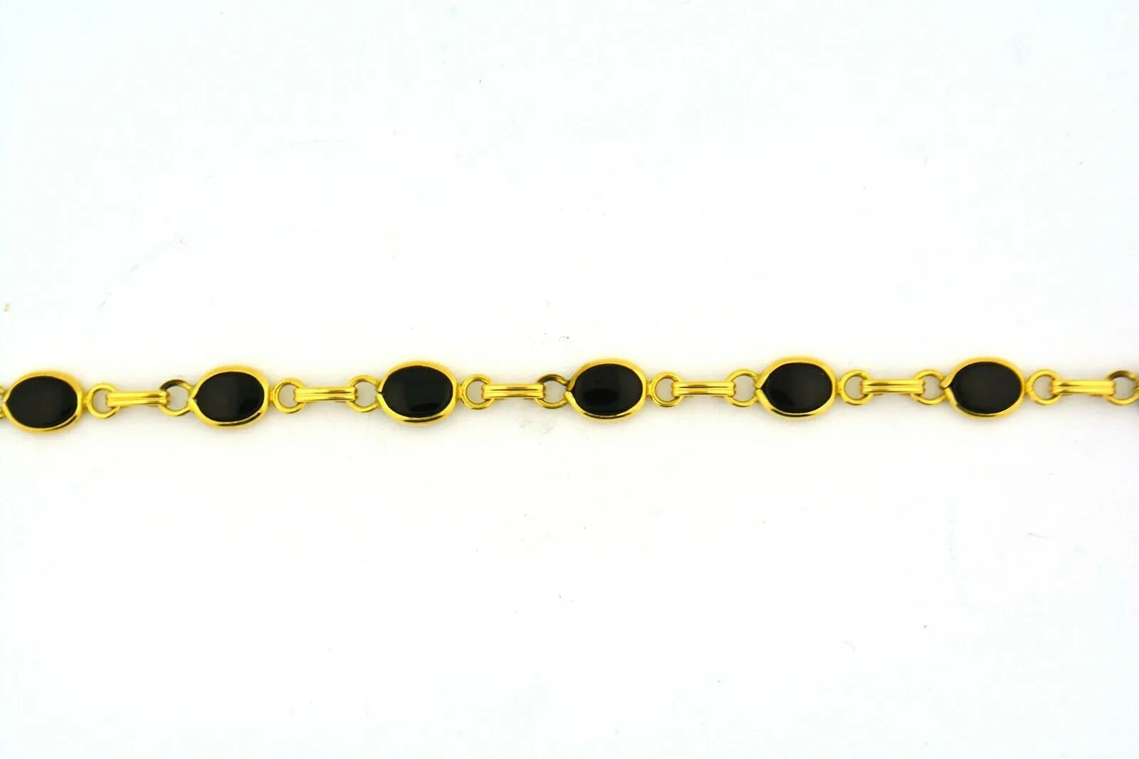 14KY Gold 7.25IN Oval Onyx Link Bracelet 6.6G (Eight 7x5MM Oval Onyx) Bezel Set